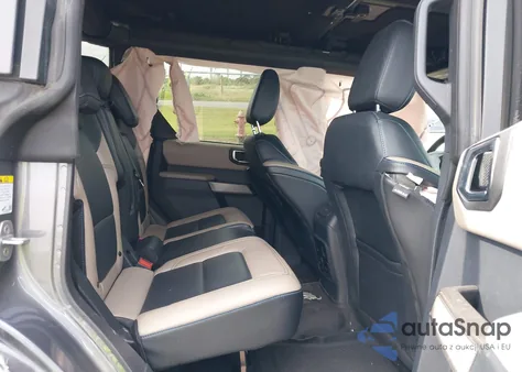 2021 Ford Bronco Wildtrak from USA, damaged, VIN 1FMEE5DP7MLB06473